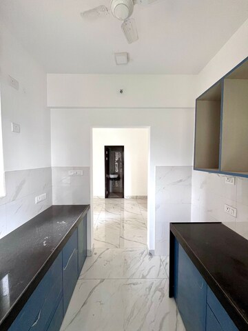 Kitchen in 1 BHK Apartment at Raymond Ten X Habitat, Pokhran Road No Two – for Sale