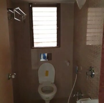 Bathroom in 1 BHK Apartment at The Makwana Om Palace, Malad West – for Rent