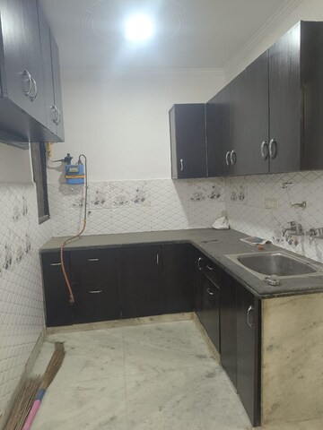 Kitchen in 3 BHK Builder Floor at Mohan Garden – for Sale