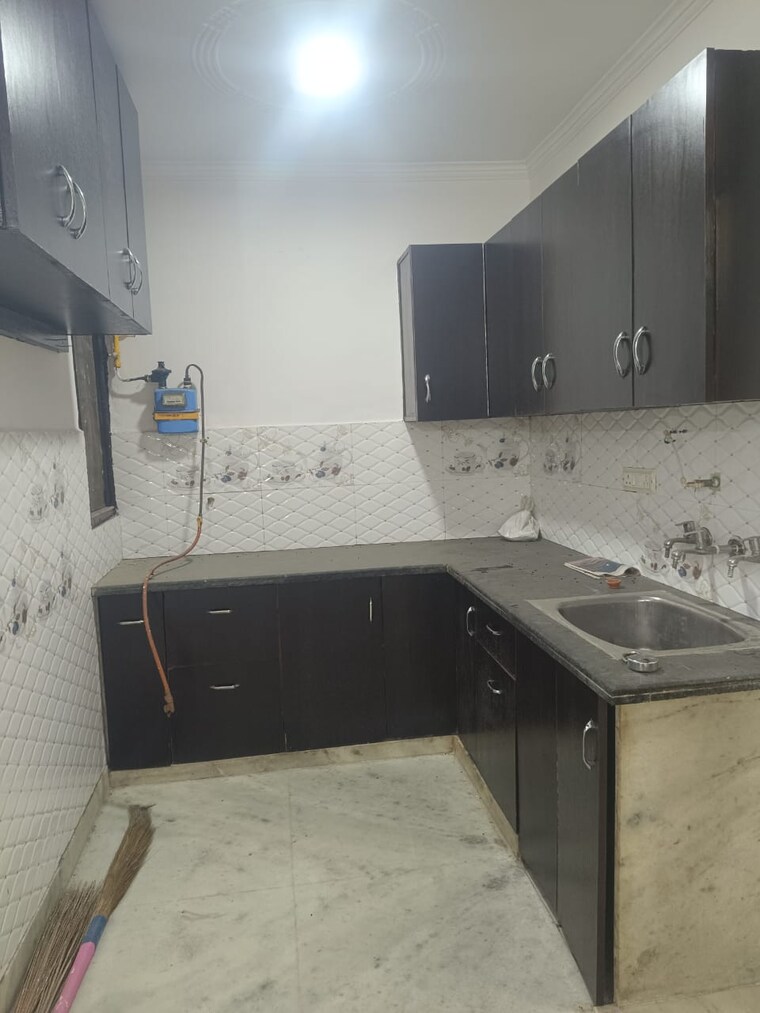 Kitchen, mohan garden 3 Bedroom 960 Sq.Ft. Builder Floor In Mohan Garden Delhi 9636520
