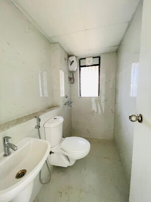 Bathroom in 2 BHK Apartment at Runwal Gardens Phase I, Dombivli East – for Rent