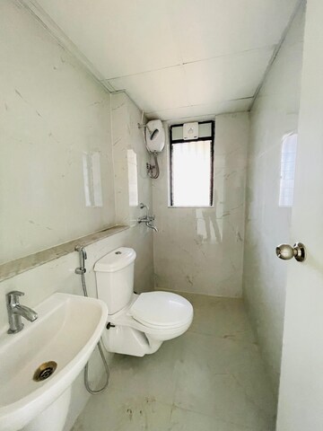 Bathroom in 2 BHK Apartment at Runwal Gardens Phase I, Dombivli East – for Rent