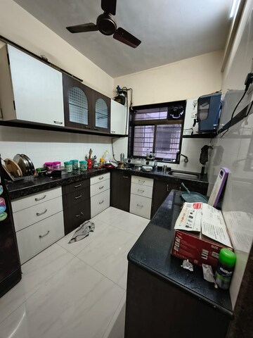 Kitchen in 2 BHK Apartment at Concrete Sai Swar, Kharghar – for Rent