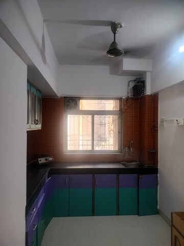 Kitchen in 1 BHK Apartment at Krishna Greenland Park Vastu Federation, Ghodbunder Road – for Rent