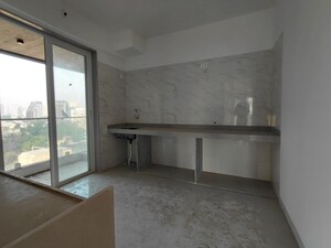 Kitchen in 3 BHK Apartment at Shreenathji Celestial Heights, Malad West – for Sale