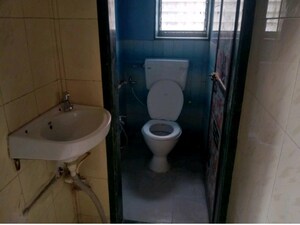 Bathroom in 1 BHK Apartment at Runwal Pearl, Manpada – for Rent