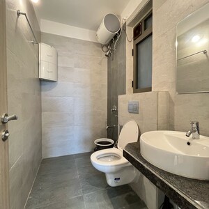 Bathroom in 3 BHK Apartment at Rustomjee Summit, Datta Pada – for Rent