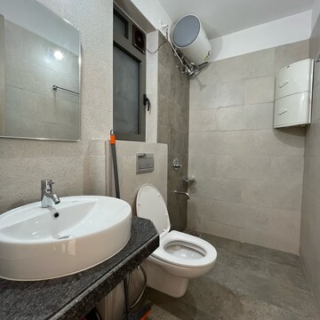 Bathroom in 3 BHK Apartment at Rustomjee Summit, Datta Pada – for Rent