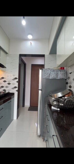 Kitchen in 1 BHK Apartment at JVM Veda, Kasarvadavali – for Rent