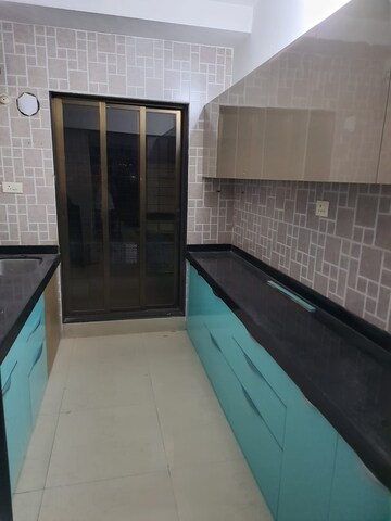 Kitchen in 2 BHK Apartment at Sawan Lifestyle, Kharghar – for Rent