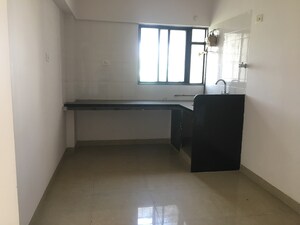 Kitchen in 2 BHK Apartment at Bhide Bhadane Bhidewadi, Vadgaon Budruk – for Rent