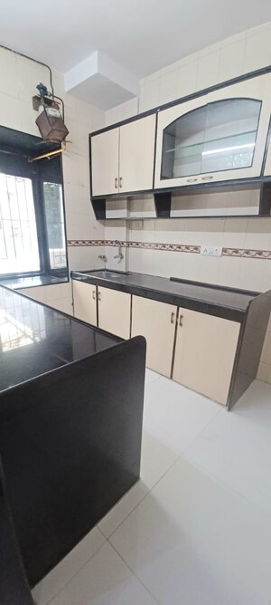 Kitchen in 1.5 BHK Apartment at Dharti CHS, Malad West – for Rent