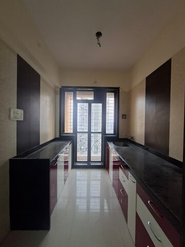 Kitchen in 1 BHK Apartment at Nisarg Hyde Park, Kharghar – for Rent
