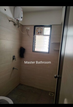 Bathroom in 2 BHK Apartment at Ajmera Exotica, Wagholi – for Rent