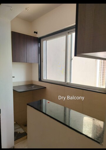 Kitchen in 2 BHK Apartment at Ajmera Exotica, Wagholi – for Rent