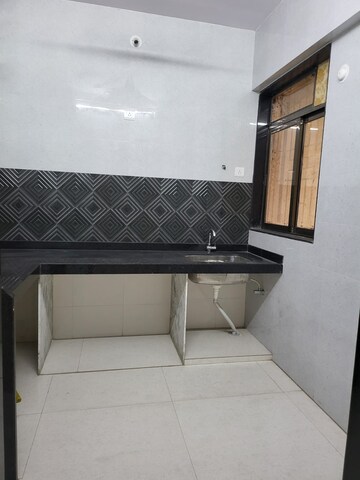 Kitchen in 1 BHK Apartment at Raymond Ten X Habitat, Pokhran Road No Two – for Rent