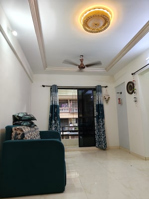 Living Room in 2 BHK Apartment at S and M Heights, Nerul – for Sale