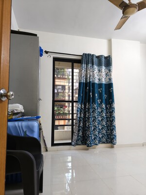 Living Room in 2 BHK Apartment at S and M Heights, Nerul – for Sale