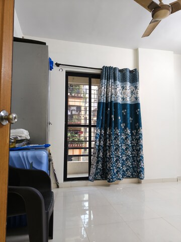 Living Room in 2 BHK Apartment at S and M Heights, Nerul – for Sale