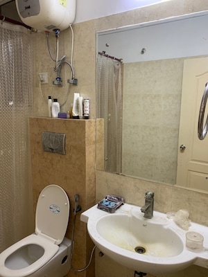 Bathroom in 3 BHK Apartment at Jaypee Greens Pavilion Heights 2, Sector 128 – for Rent