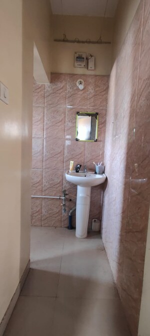 Bathroom in 2 BHK Apartment at Spring Dales, Kharadi – for Rent