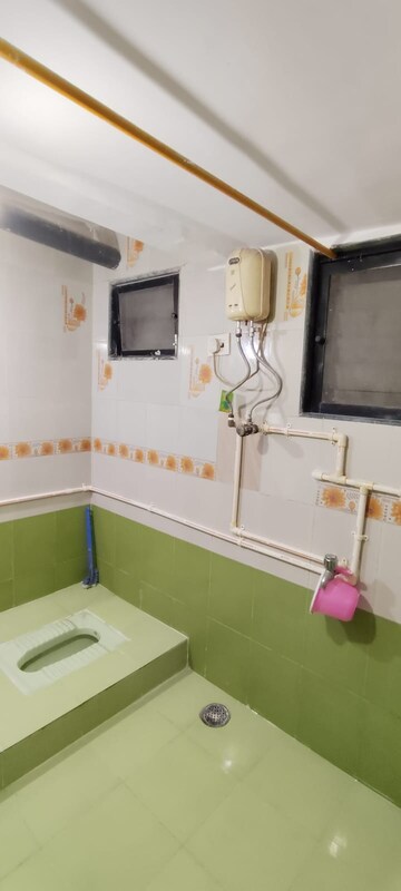 Bathroom in 1 BHK Apartment at Runwal Estate, Dhokali – for Rent