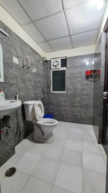 Bathroom in 2 BHK Apartment at Sangwan Heights, Raj Nagar Extension – for Rent