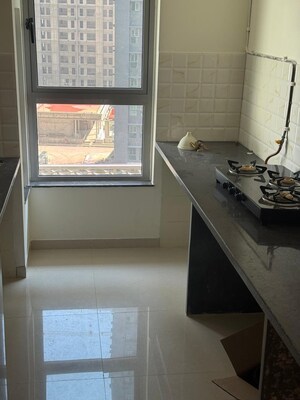 Kitchen in 2 BHK Apartment at Kalpataru Immensa, Kolshet Road – for Rent