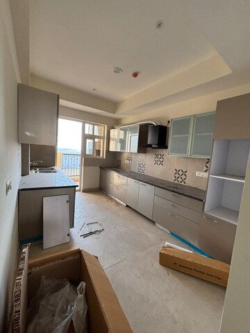 Kitchen in 4 BHK Apartment at ATS Triumph, Dhanwapur – for Rent