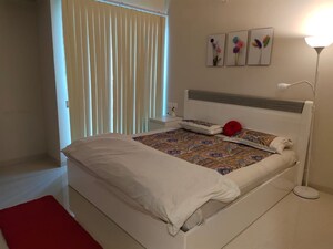 Bedroom in 2 BHK Apartment at Rustomjee Urbania Azziano, Thane West – for Rent