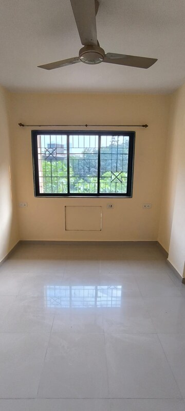 Room in 1 BHK Apartment at Puraniks Kavya Dhara CHS, Dhokali – for Rent