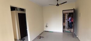 Room in 1 BHK Apartment at Puraniks Kavya Dhara CHS, Dhokali – for Rent