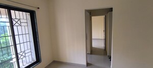 Room in 1 BHK Apartment at Puraniks Kavya Dhara CHS, Dhokali – for Rent