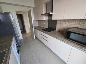 Kitchen in 2.5 BHK Apartment at DLF Regal Gardens, Sector 90 – for Rent