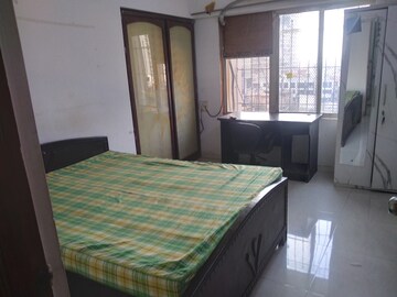Bedroom in 2 BHK Apartment at Galaxy Heights, Goregaon West – for Rent