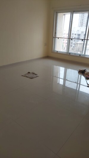 Living Room in 2 BHK Apartment at Romell Diva, Malad West – for Rent