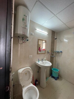 Bathroom in 2.5 BHK Apartment at Apex Golf Avenue, Sector 1 Greater Noida – for Rent