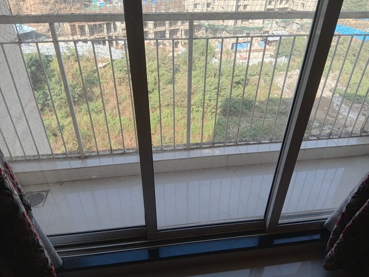 Balcony, puranik-tokyo-bay-phase-2a 2 Bedroom 650 Sq.Ft. Apartment In Kasarvadavali Thane 9639322