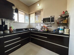 Kitchen in 2 BHK Apartment at Sun City, Sinhagad Road – for Sale