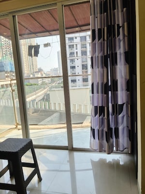 Balcony in 1 BHK Apartment at Lotus Lotus Link Square, Malad West – for Rent