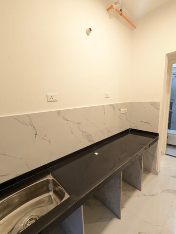 Kitchen in 1 BHK Apartment at Ruparel Sky Green, Kandivali West – for Sale