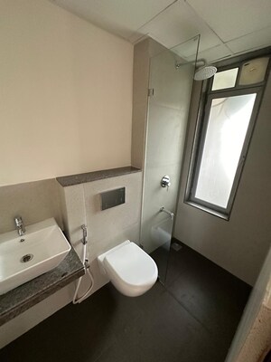 Bathroom in 2 BHK Apartment at Piramal Vaikunth, Balkum Pada – for Rent