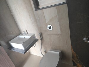 Bathroom in 2 BHK Apartment at Welworth Bluescapes, Anand Nagar – for Rent