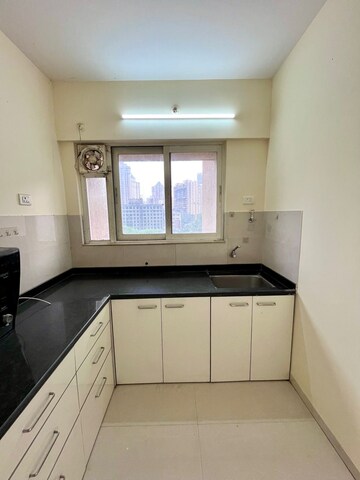 Kitchen in 3 BHK Apartment at Vijay Orovia, Ghodbunder Road – for Rent