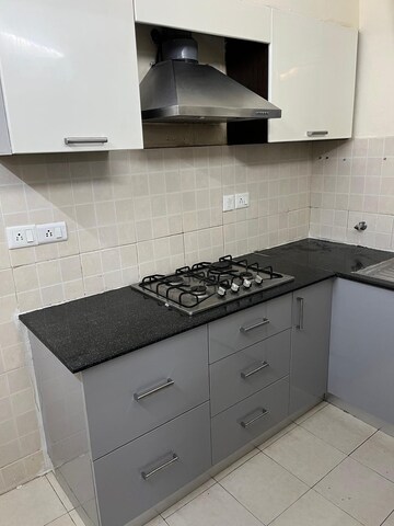 Kitchen in 3 BHK Builder Floor at Ansal API Esencia, Sector 67 – for Rent