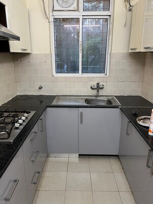 Kitchen in 3 BHK Builder Floor at Ansal API Esencia, Sector 67 – for Rent