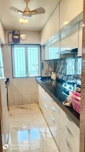 Kitchen in 2 BHK Apartment at Adinath CHS, Borivali West – for Sale