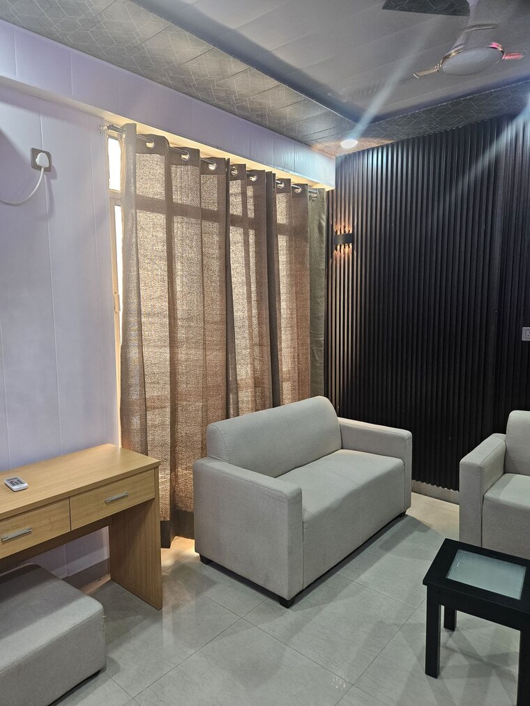 Living Room, supertech-czar-suites Studio 450 Sq.Ft. Apartment In Omicron I Greater Noida Greater Noida 9640285