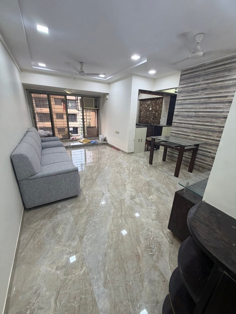 Living Room, rna-ng-suncity-phase-iii 2 Bedroom 690 Sq.Ft. Apartment In Kandivali East Mumbai 9640361