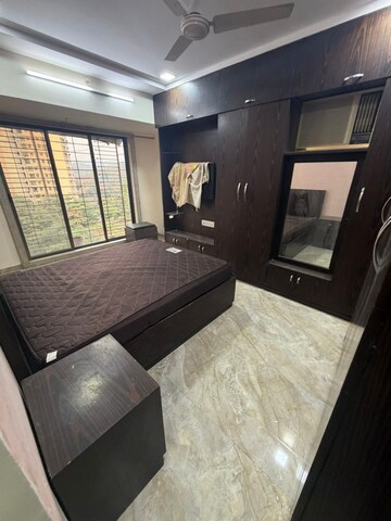 Bedroom in 2 BHK Apartment at RNA NG Suncity Phase III, Kandivali East – for Rent
